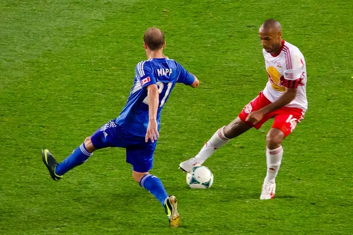 Thierry Henry shows Justin Mapp his ball control.